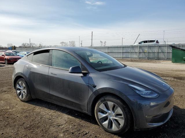 7SAYGDEE5NF331940 - 2022 TESLA MODEL Y Graphit Foto 4