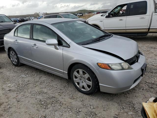 1HGFA16506L083339 - 2006 HONDA CIVIC LX SILVER photo 4