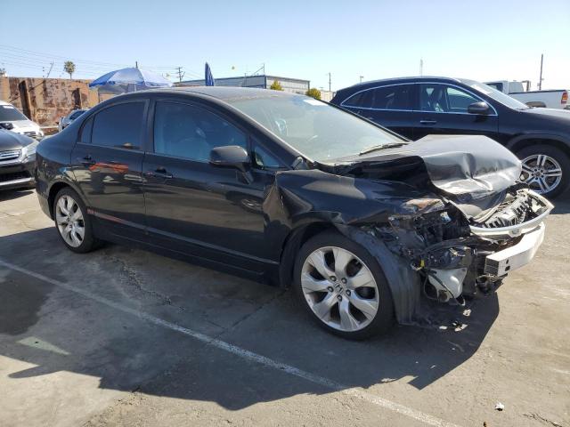 2HGFA1F57BH305799 - 2011 HONDA CIVIC LX BLACK photo 4