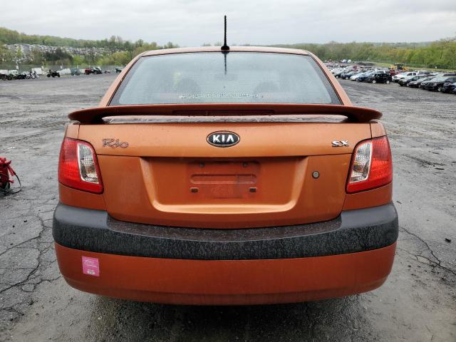 KNADE223196475802 - 2009 KIA RIO BASE ORANGE photo 6