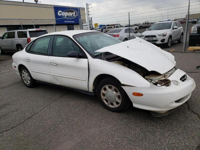 1FAFP52U2WG170319 - 1999 FORD TAURUS LX WHITE photo 4