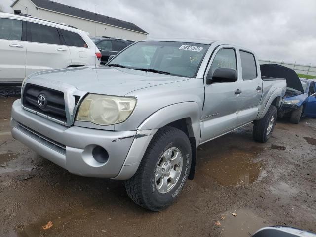 5TEMU52N79Z660691 - 2009 TOYOTA TACOMA DOUBLE CAB LONG BED SILVER photo 1