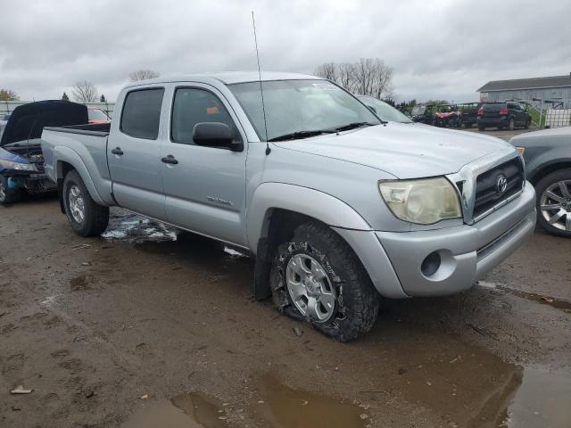 5TEMU52N79Z660691 - 2009 TOYOTA TACOMA DOUBLE CAB LONG BED SILVER photo 4