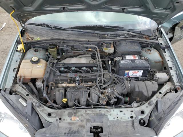 1FAFP34NX5W297852 - 2005 FORD FOCUS ZX4 TURQUOISE photo 11