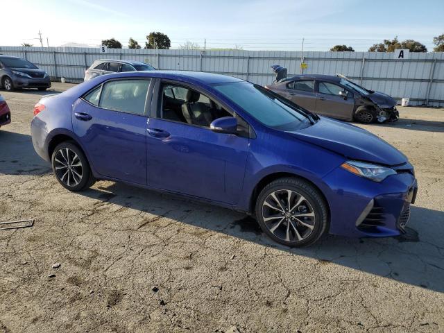 5YFBURHE2HP704297 - 2017 TOYOTA COROLLA L BLUE photo 4