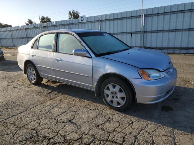 1HGES26741L064849 - 2001 HONDA CIVIC EX SILVER photo 4