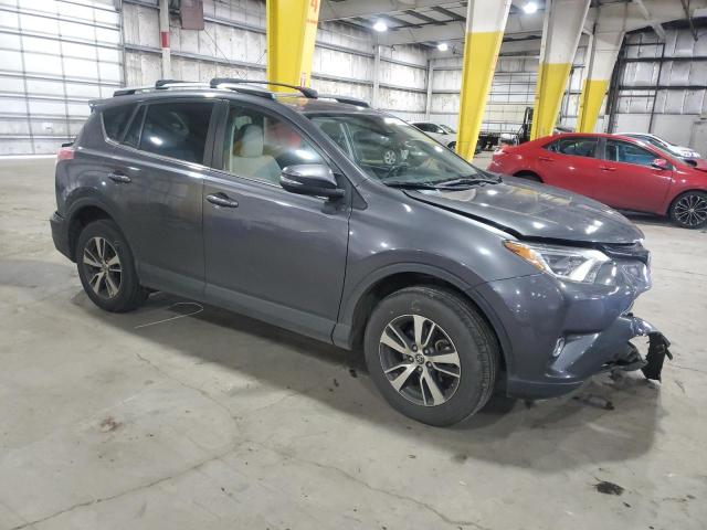 JTMRFREV6HJ164180 - 2017 TOYOTA RAV4 XLE GRAY photo 4