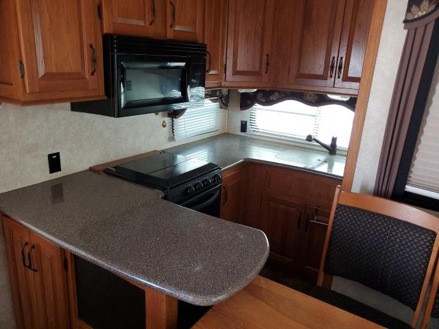 4YDF29524D4730718 - 2013 KEYSTONE TRAILER WHITE photo 5