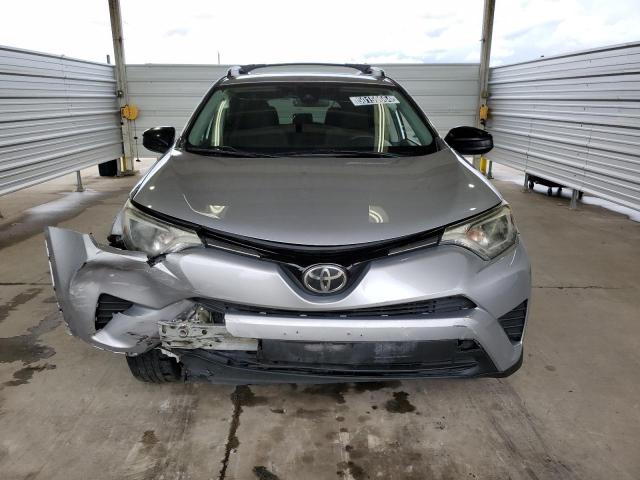 2T3ZFREV0HW360245 - 2017 TOYOTA RAV4 LE SILVER photo 5