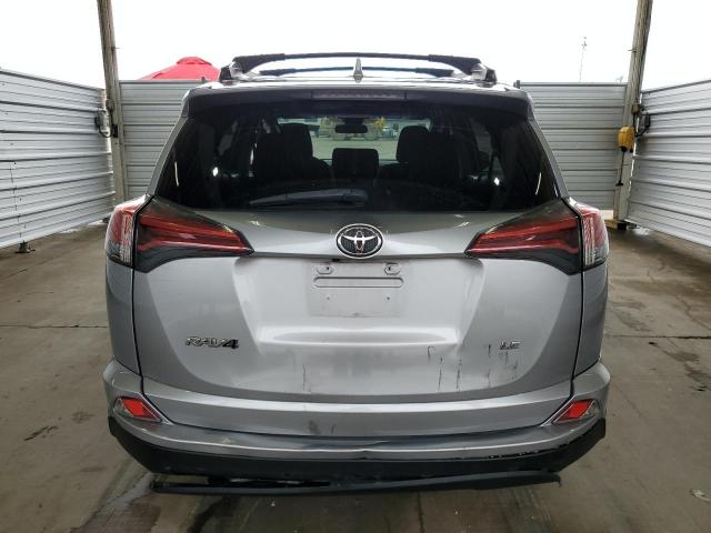 2T3ZFREV0HW360245 - 2017 TOYOTA RAV4 LE SILVER photo 6