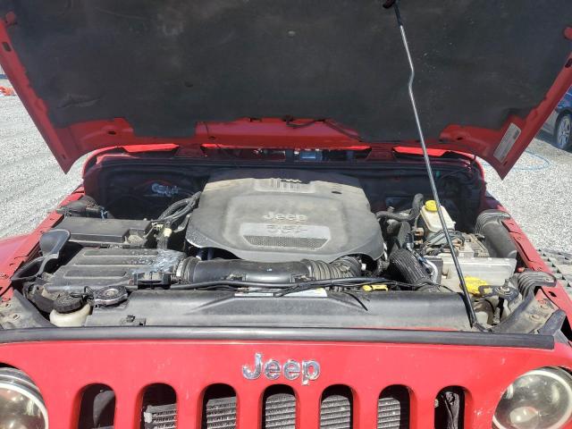 1C4BJWEG6CL105756 - 2012 JEEP WRANGLER U SAHARA RED photo 11