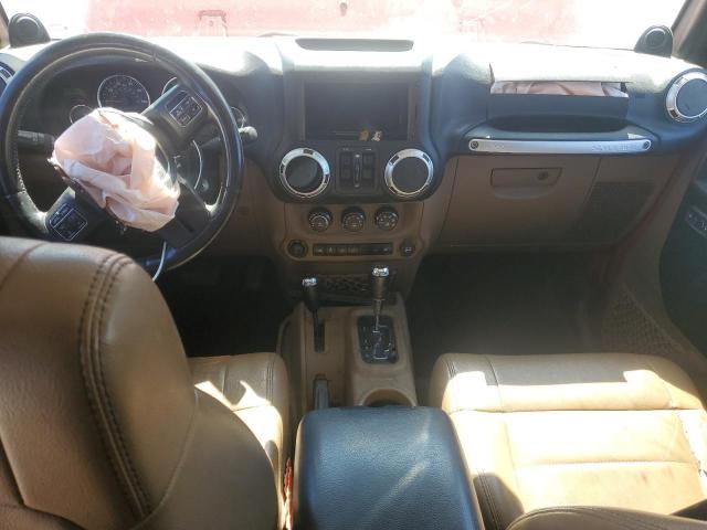 1C4BJWEG6CL105756 - 2012 JEEP WRANGLER U SAHARA RED photo 8