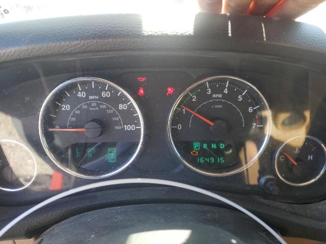 1C4BJWEG6CL105756 - 2012 JEEP WRANGLER U SAHARA RED photo 9