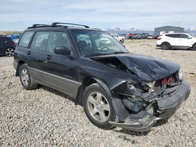 JF1SF6552XH728855 - 1999 SUBARU FORESTER S შავი ფოტო 4