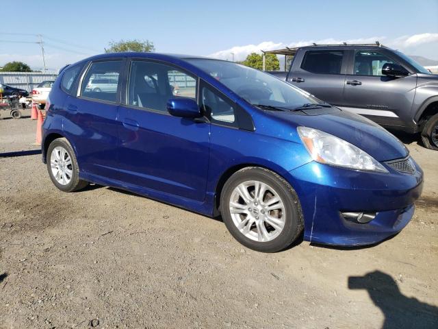 JHMGE884X9S041998 - 2009 HONDA FIT SPORT BLUE photo 4