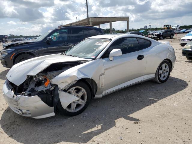 KMHHM65D64U127142 - 2004 HYUNDAI TIBURON SILVER photo 1