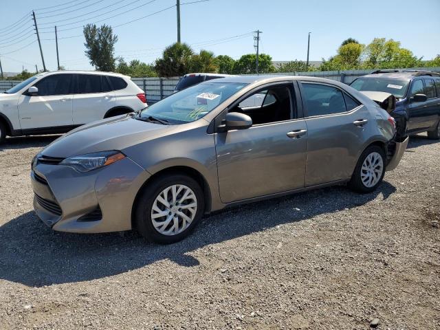 5YFBURHE9KP858237 - 2019 TOYOTA COROLLA L GRAY photo 1