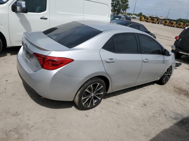 5YFBURHE2HP614390 - 2017 TOYOTA COROLLA L SILVER photo 3