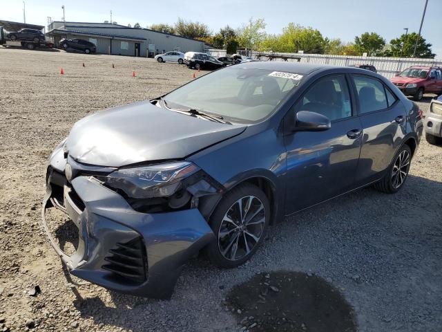 5YFBURHE9HP661058 - 2017 TOYOTA COROLLA L GRAY photo 1