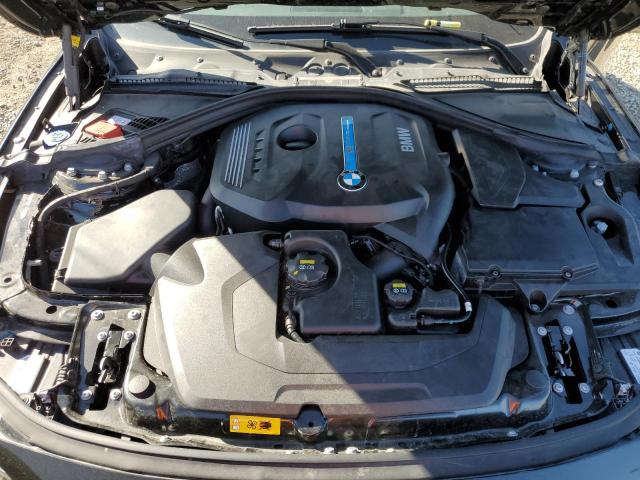 WBA8E1C56JA758788 - 2018 BMW 330E BLACK photo 11