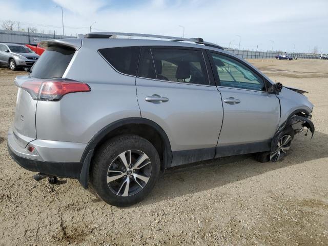 2T3BFREV6JW808690 - 2018 TOYOTA RAV4 LE SILVER photo 3