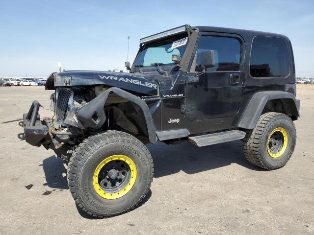 1J4FA29P61P302348 - 2001 JEEP WRANGLER / SE BLACK photo 1