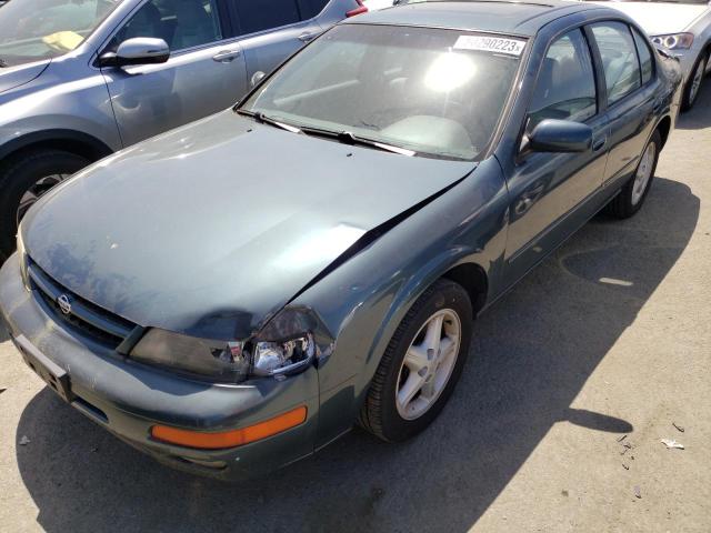 JN1CA21D3XT814159 - 1999 NISSAN MAXIMA GLE GREEN photo 1