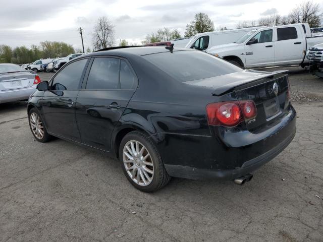 3VWRJ71KX9M038453 - 2009 VOLKSWAGEN JETTA WOLFSBURG 黑色 照片 2
