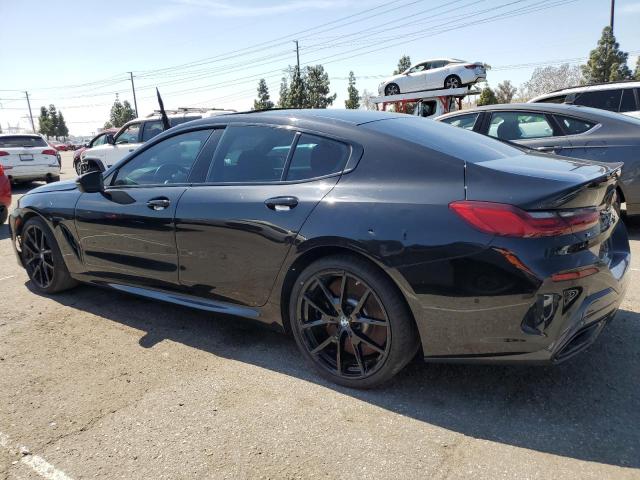 WBAGV8C02NCK08667 - 2022 BMW M850XI BLACK photo 2