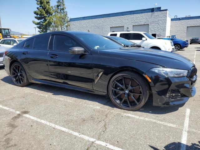 WBAGV8C02NCK08667 - 2022 BMW M850XI BLACK photo 4