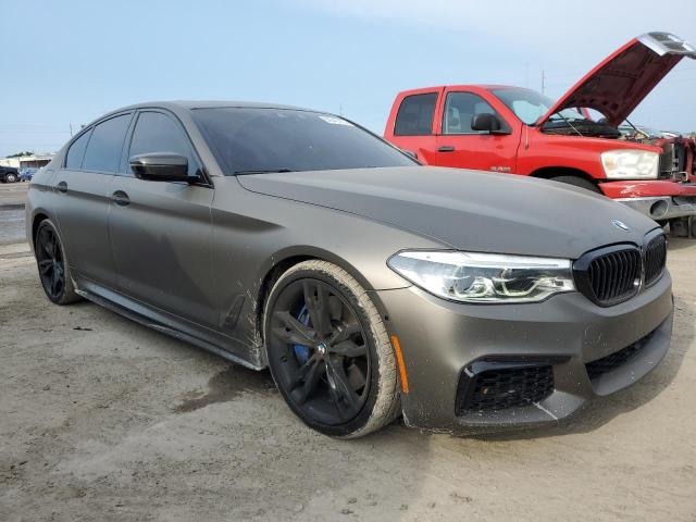 WBAJB9C54JB036805 - 2018 BMW M550XI BROWN photo 4