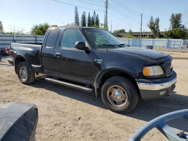 2FTRX08L11CA46920 - 2001 FORD F150 BLACK photo 4