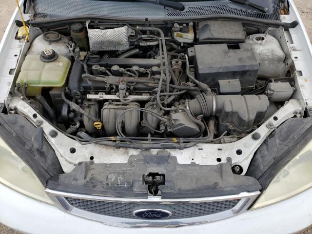 3FAFP37NX5R141812 - 2005 FORD FOCUS ZX5 WHITE photo 11