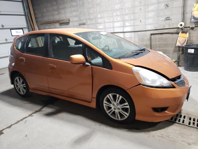 JHMGE8H4XAC010149 - 2010 HONDA FIT SPORT ORANGE photo 4