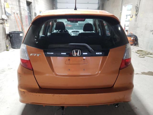 JHMGE8H4XAC010149 - 2010 HONDA FIT SPORT ORANGE photo 6