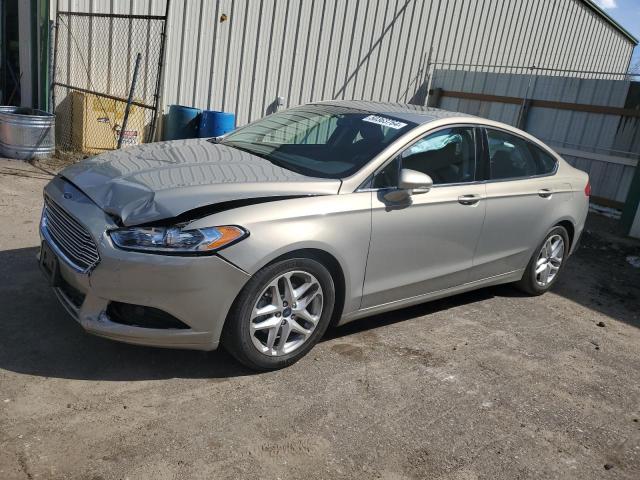 3FA6P0H73FR225292 - 2015 FORD FUSION SE GOLD photo 1