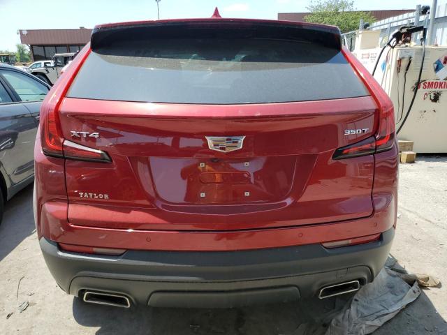 1GYAZAR46NF116968 - 2022 CADILLAC XT4 LUXURY RED photo 6