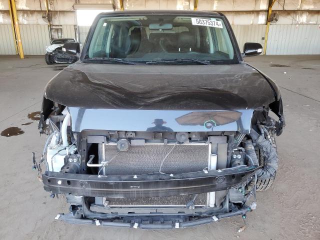 JTLKE50E981030210 - 2008 TOYOTA SCION XB BLACK photo 5