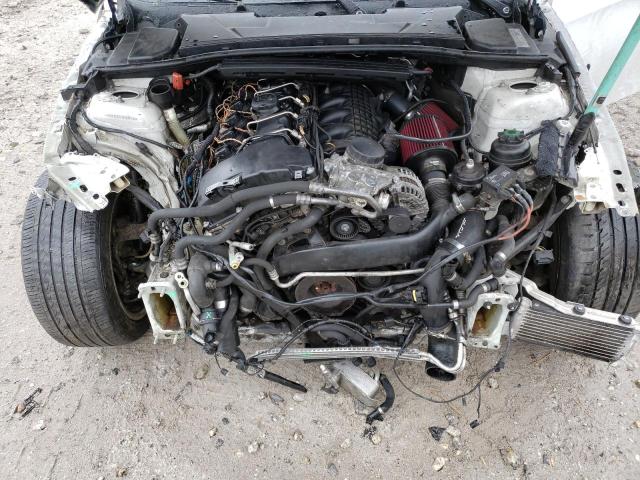 WBADX1C57BE569943 - 2011 BMW 335 IS WHITE photo 11