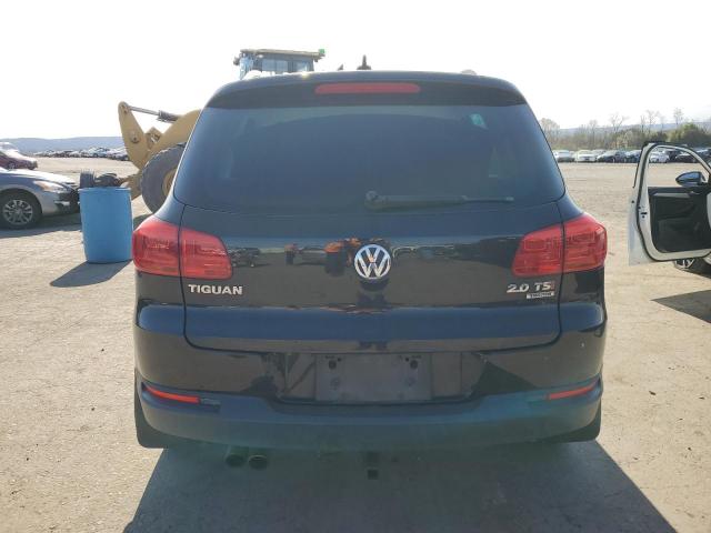 WVGBV3AX4EW541317 - 2014 VOLKSWAGEN TIGUAN S BLACK photo 6