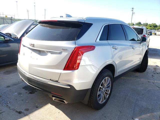 1GYKNCRS4KZ284709 - 2019 CADILLAC XT5 LUXURY SILVER photo 4