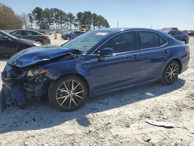 4T1T11AK9RU235630 - 2024 TOYOTA CAMRY SE NIGHT SHADE BLUE photo 1