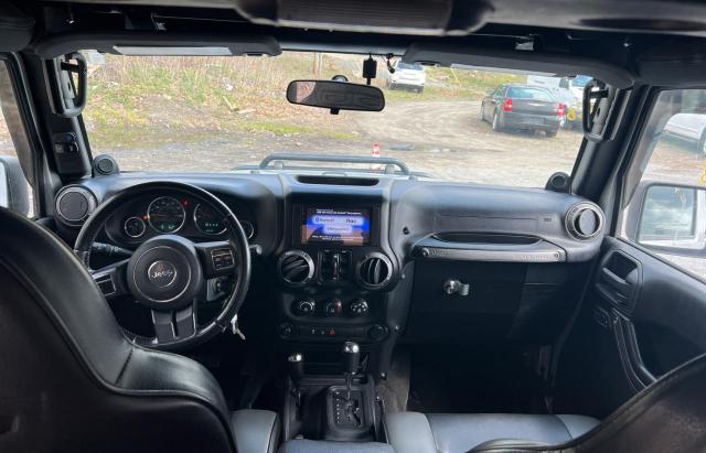 1J4HA3H16BL500982 - 2011 JEEP WRANGLER U SPORT فضي صورة 9