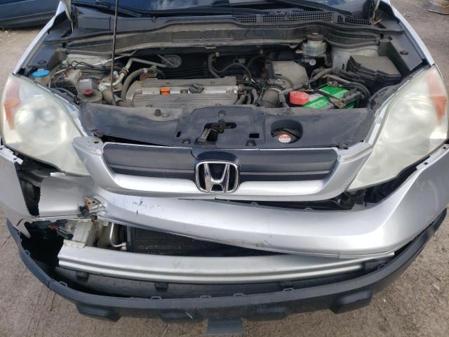 5J6RE483X9L059237 - 2009 HONDA CR-V LX SILVER photo 12