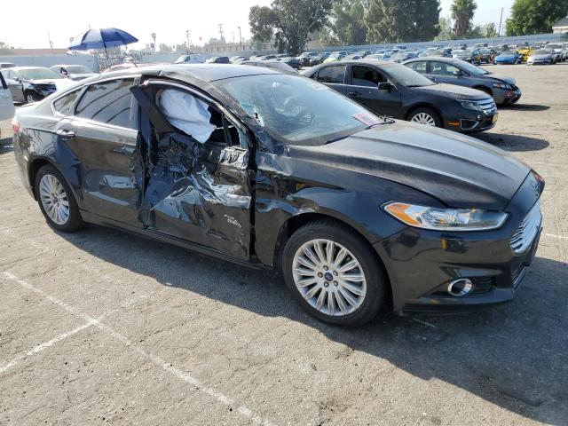 3FA6P0SU9DR235241 - 2013 FORD FUSION TITANIUM PHEV BLACK photo 4