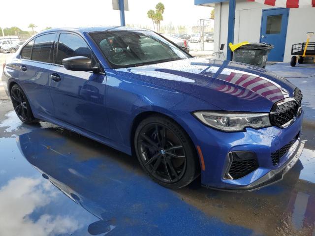 3MW5U7J08L8B43402 - 2020 BMW M340I BLUE photo 4