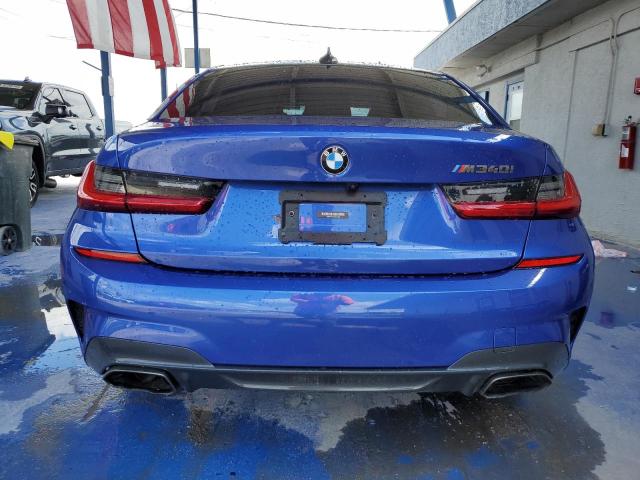 3MW5U7J08L8B43402 - 2020 BMW M340I BLUE photo 6