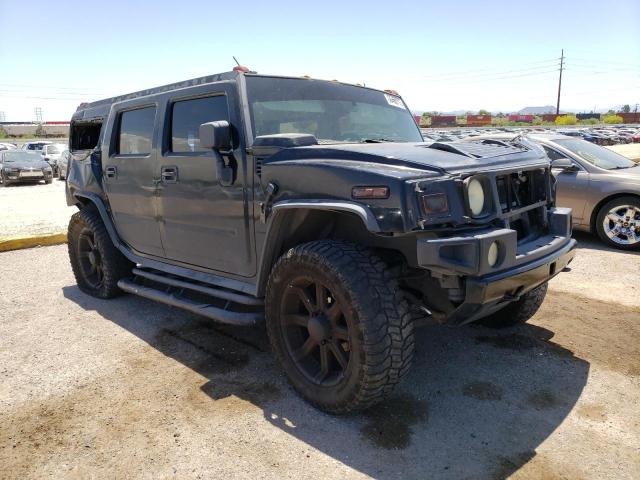 5GRGN23U03H112103 - 2003 HUMMER H2 BLACK photo 4