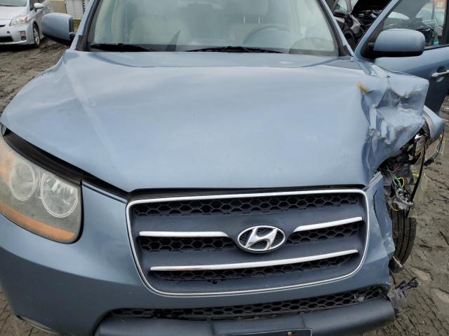 5NMSH13E69H312304 - 2009 HYUNDAI SANTA FE SE BLUE photo 11