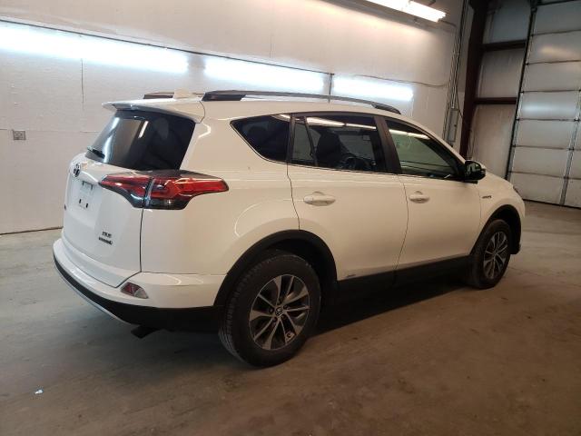 JTMRJREV0JD212467 - 2018 TOYOTA RAV4 HV LE WHITE photo 3